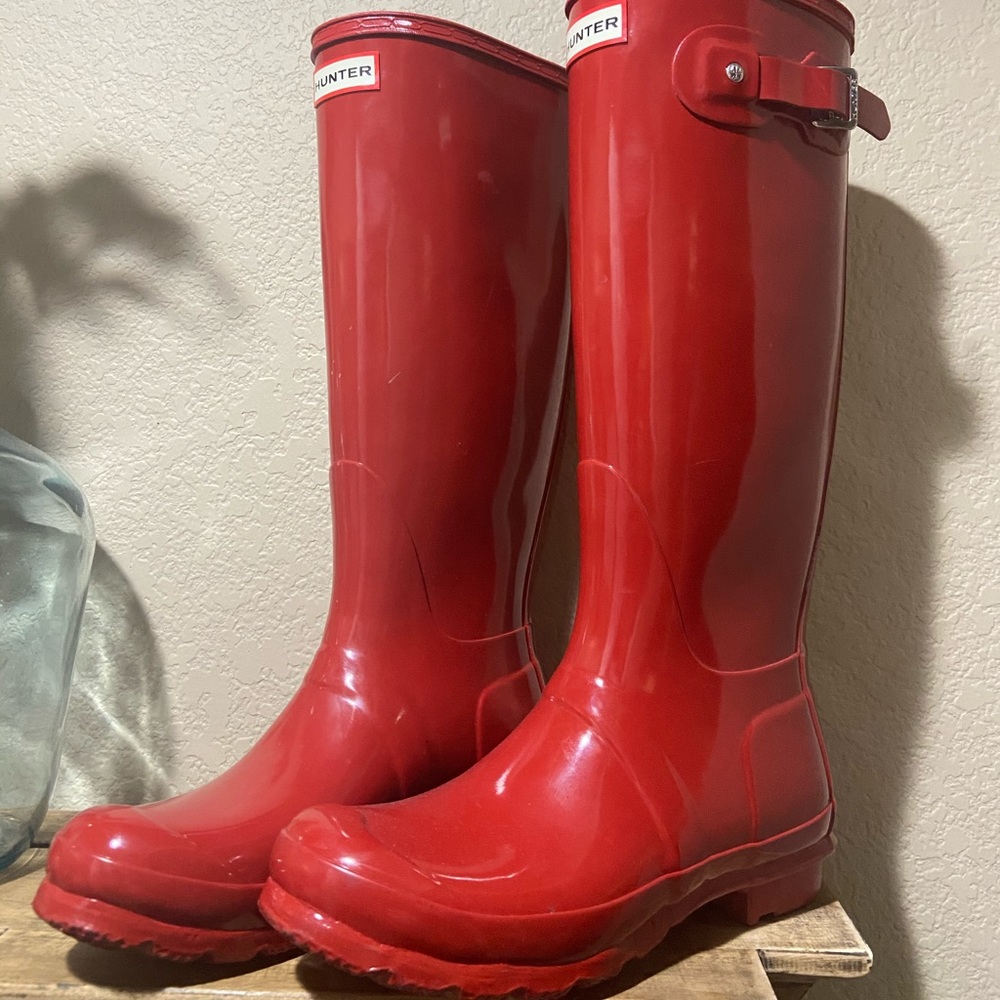 Tall red hunter boots